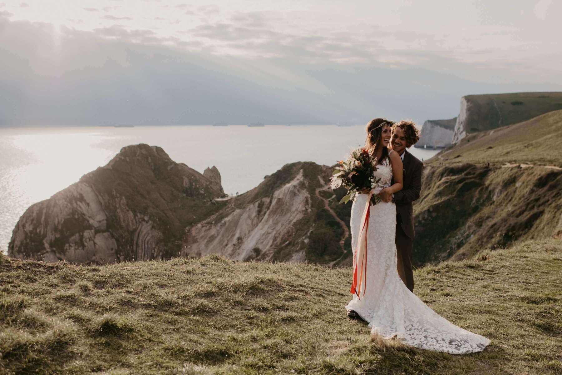 Boho Elopement Styled Shoot Lulworth Cove Love Spell Design lace wedding dress boho wedding dress wedding dress shop near me brida shop near me 2
